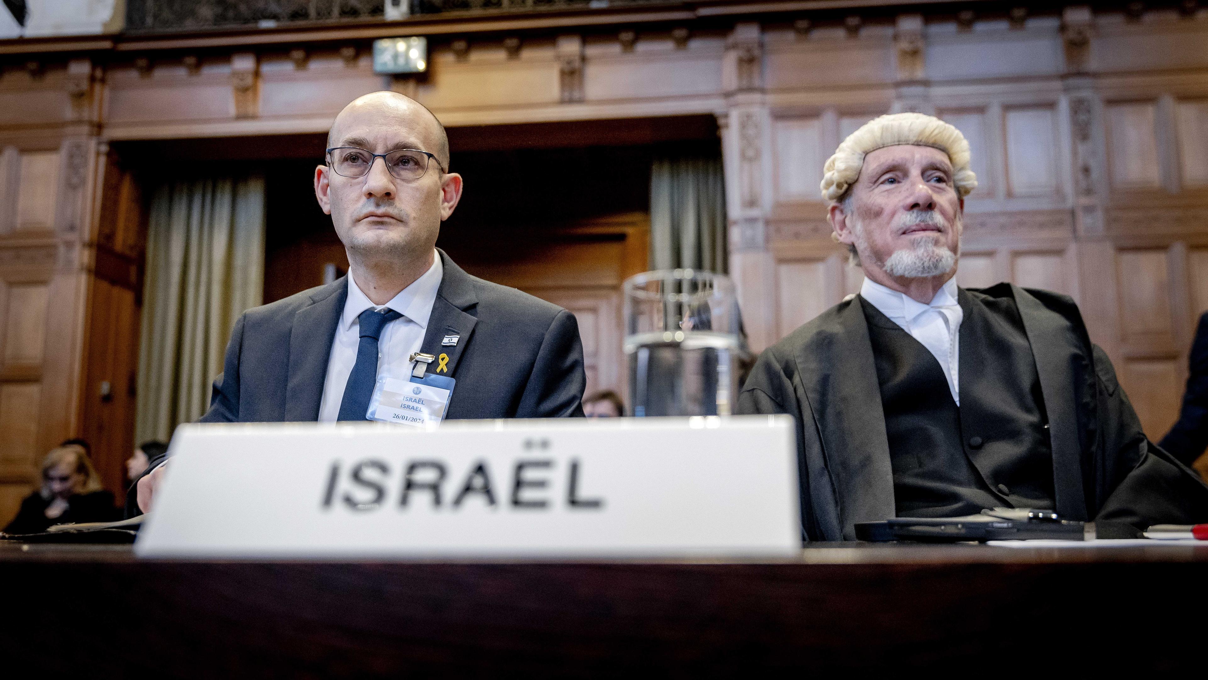 Gilad Noam, Deputy Attorney-General for International Affairs, and lawyer Malcolm Shaw during a ruling by the International Court of Justice (ICJ) in The Hague, The Netherlands, on a request by South Africa for emergency measures for Gaza, 26 January 2024.