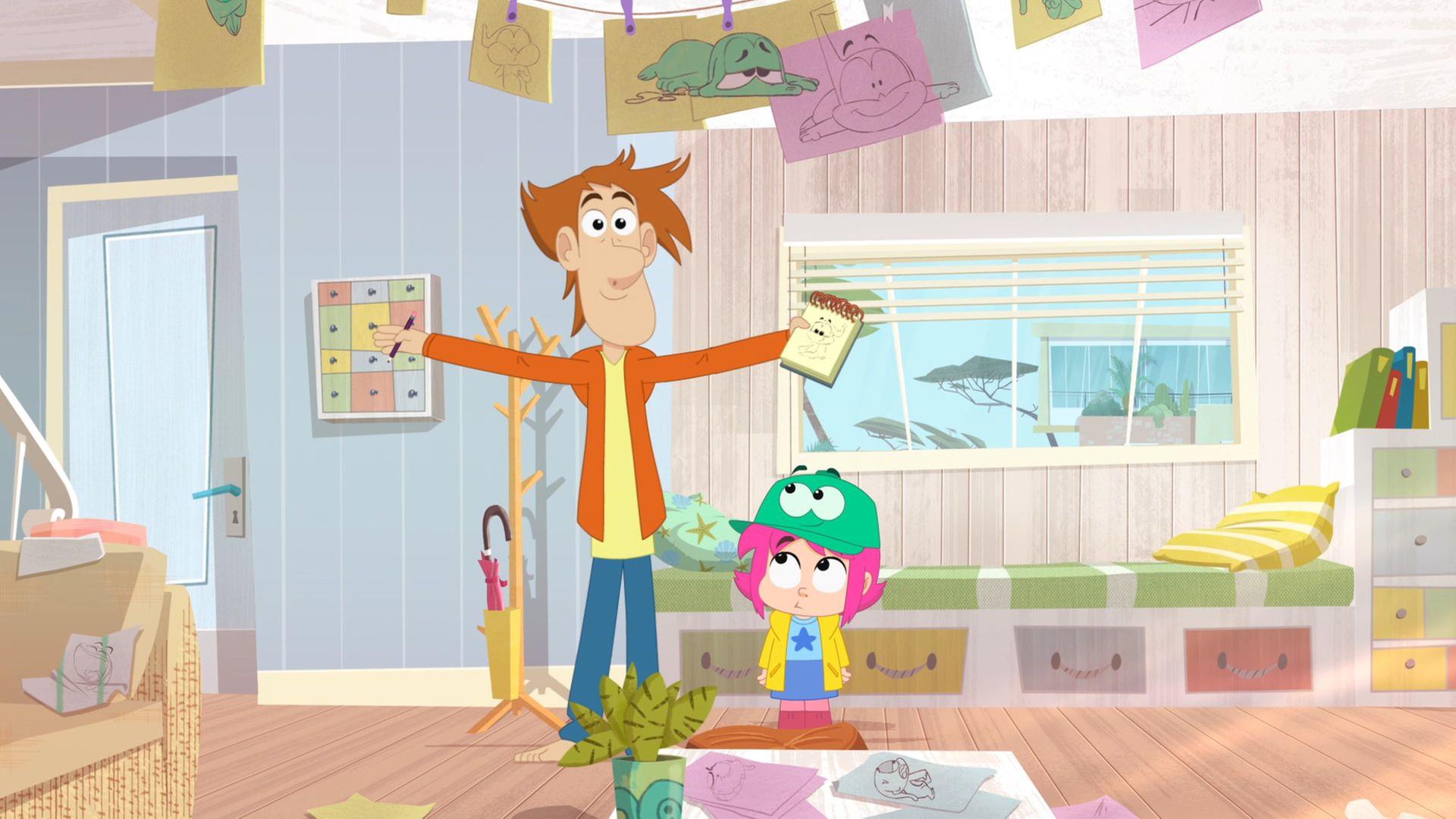 Rebeccas Papa steht mit begeisterter Miene und einem Zeichenblock inh der Hand im Wohnzimmer. Rebecca und Ernest stehen neben ihm. Ernest ist als Rebeccas Hut verkleidet und überall liegen Zeichnungen von ihm.