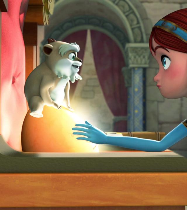 Derke sitzt auf dem leuchtenden Drachenstein, der auf dem Thron liegt. Marian, die vor dem Thron steht, legt ihre Hände darauf.