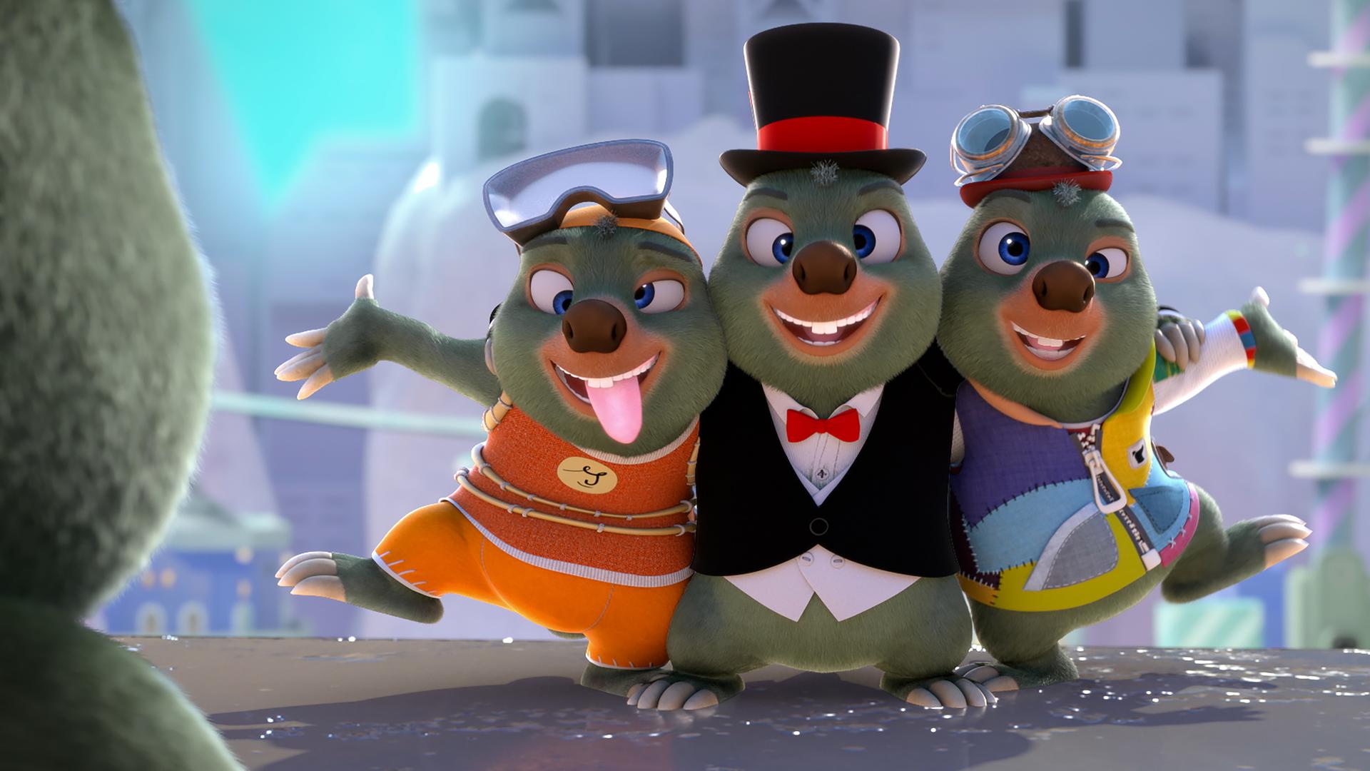 Drei Moleys in unterschiedlicher Kleidung stehen in freundschaftlicher Umarmung nebeneinander. Der Moley in der Mitte trägt einen schwarzem Zylinder, der links hat eine Taucherbrille auf dem Kopf, der rechts eine Spaßbrille. Alle drei haben einen schielenden Blick.