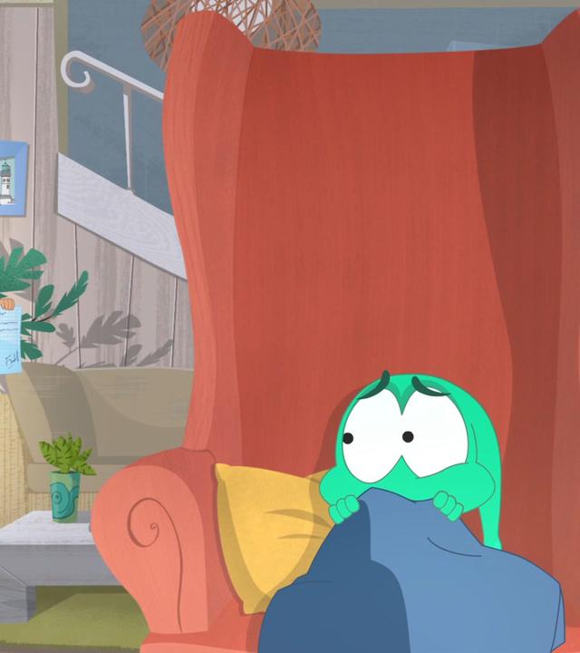 Die wütende Schuldirektorin hält Rebecca am Arm, während Ernest sich ängstlich auf einem Sessel hinter einem Kissen versteckt.