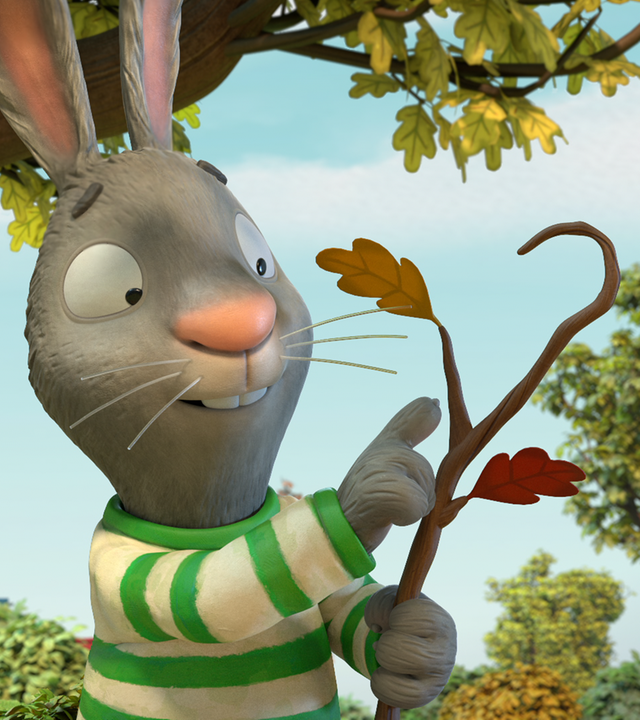 Pip hält einen besonders geformten Stock in der Hand.