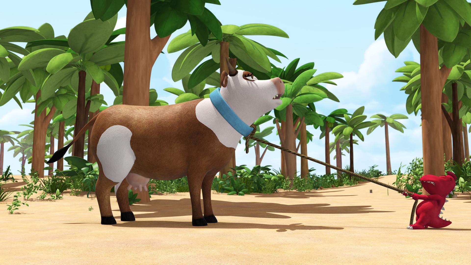 Oskar zieht kräftig an der Leine einer Kuh. Doch diese rührt sich kein Stück.