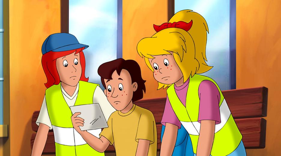 Bibi, Tina und der Ausreißer betrachten einen Zettel.