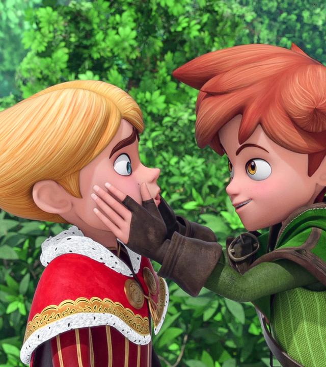 Robin Hood hält Prinz Johns Gesicht mit beiden Händen fest.