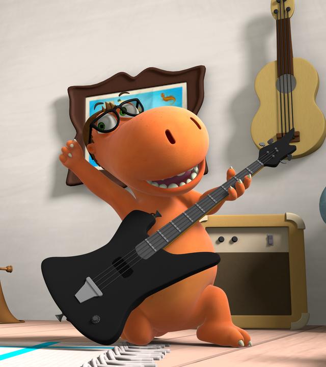 Kokosnuss ist gekleidet wie der Rockstar Rocko Rolla und spielt in einem Zimmer Gitarre.