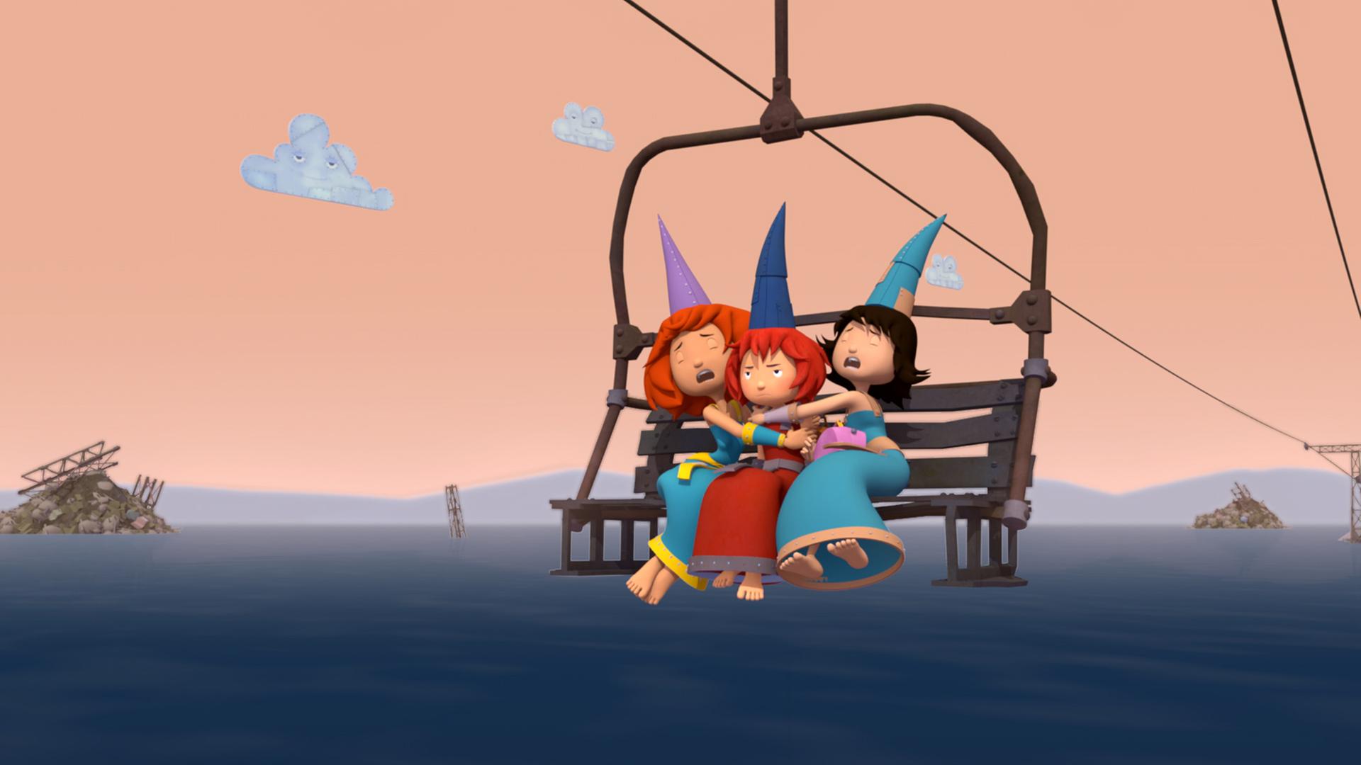 Drei Burgfräuleins sitzen im Sessellift fest und klammern sich an Bö, die in der Mitte sitzt.