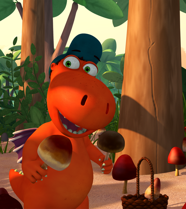 Der kleine Drache Kokosnuss und Matilda sammeln die geheimen Pilze im Wald. Sie haben schon viele gefunden und halten einige in den Händen.