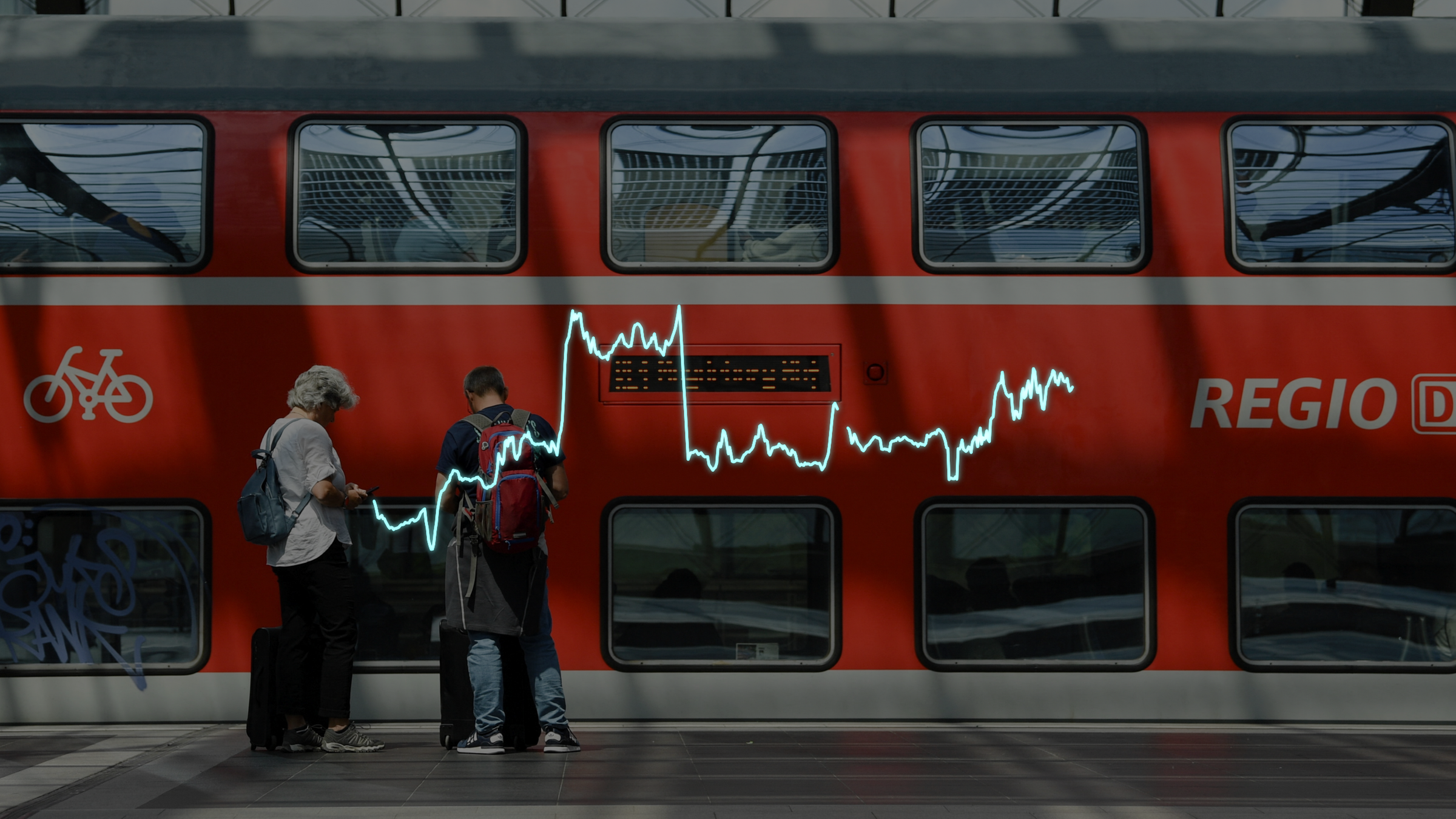 Regionalbahn im Bahnhof, davor ein Liniendiagramm mit Mobilitätsdaten