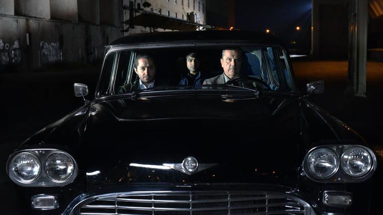 Sakari Kuosmanen, Sherwan Haji und Simon Al-Bazoon in einer Filmszene