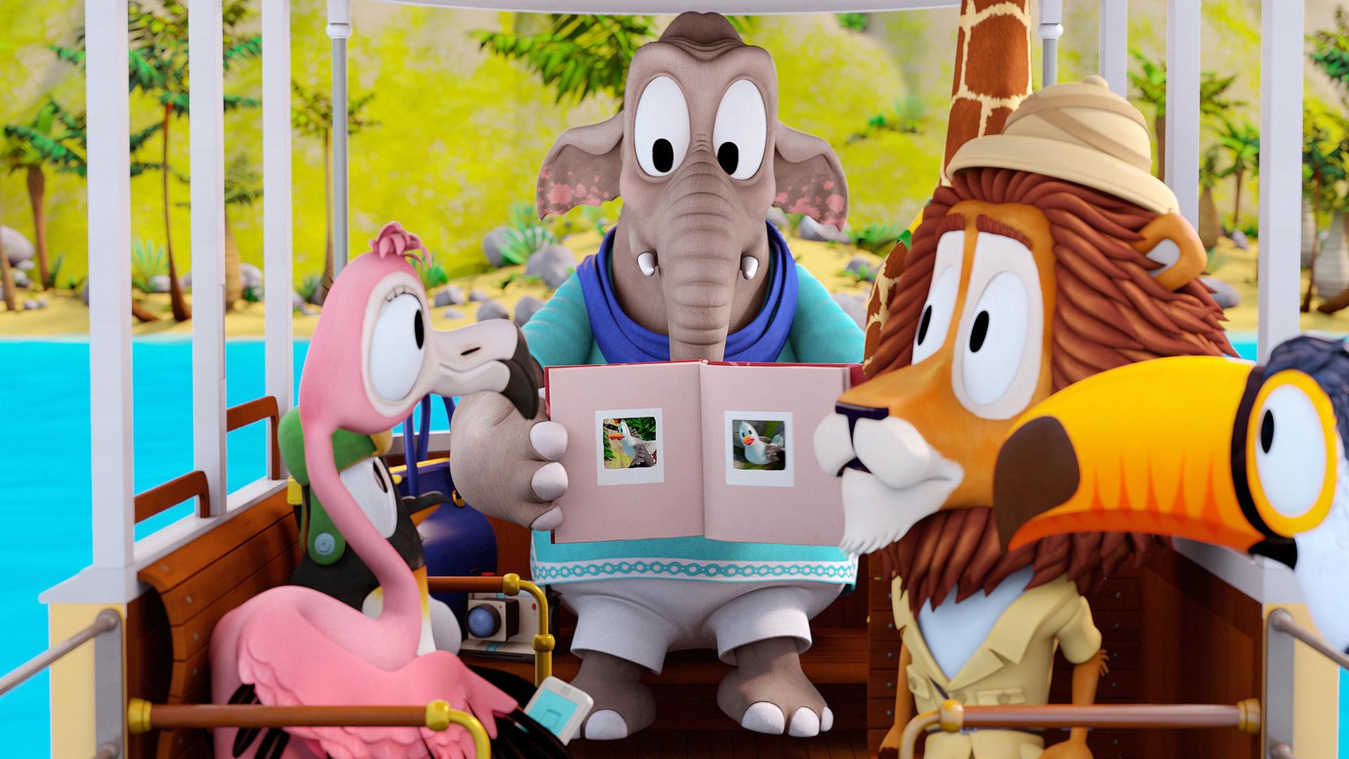 Die Elefantendame zeigt den anderen Zootieren ein Fotobuch mit Fotos von schönen Vögeln.