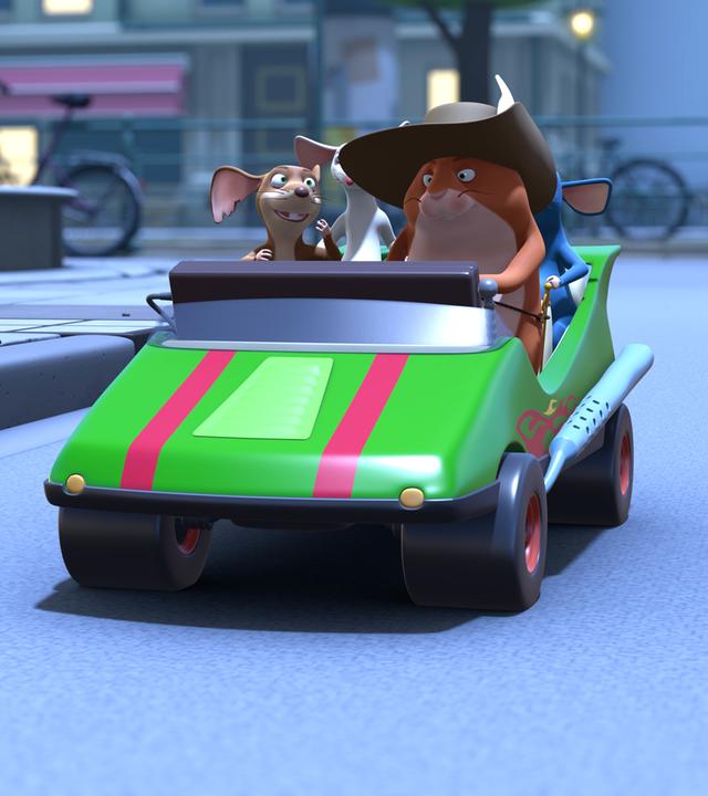 Die Muskeltiere sind stolze Besitzer eines elektrischen Spielzeugautos geworden.