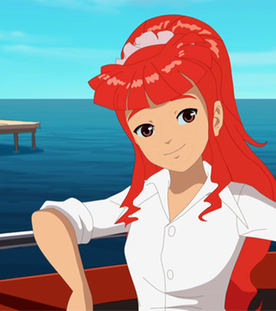 Rikki und Cleo stehen am Meer.