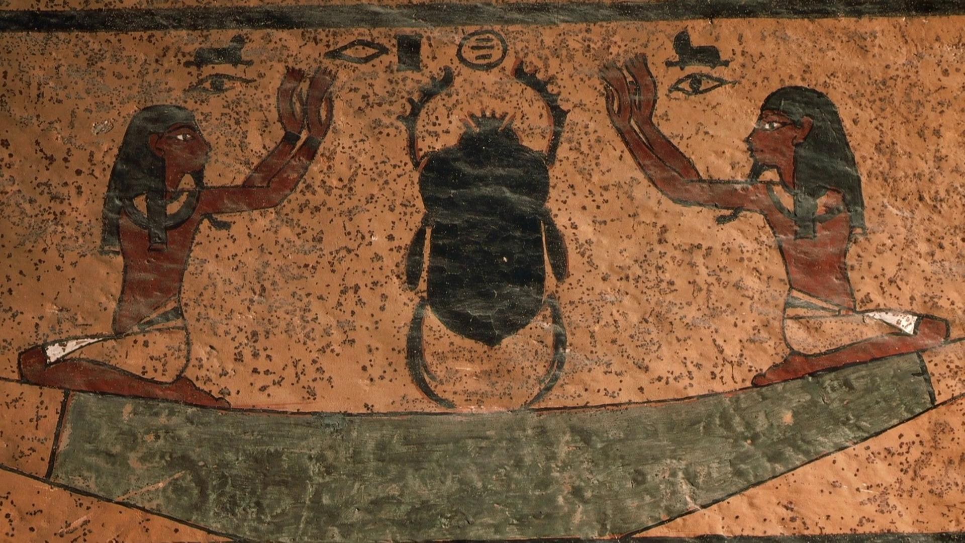 Eine ägyptische Wandmalerei zeigt zwei Personen, die mit erhobenen Armen einen mächtigen "Pillendreher" anbeten.