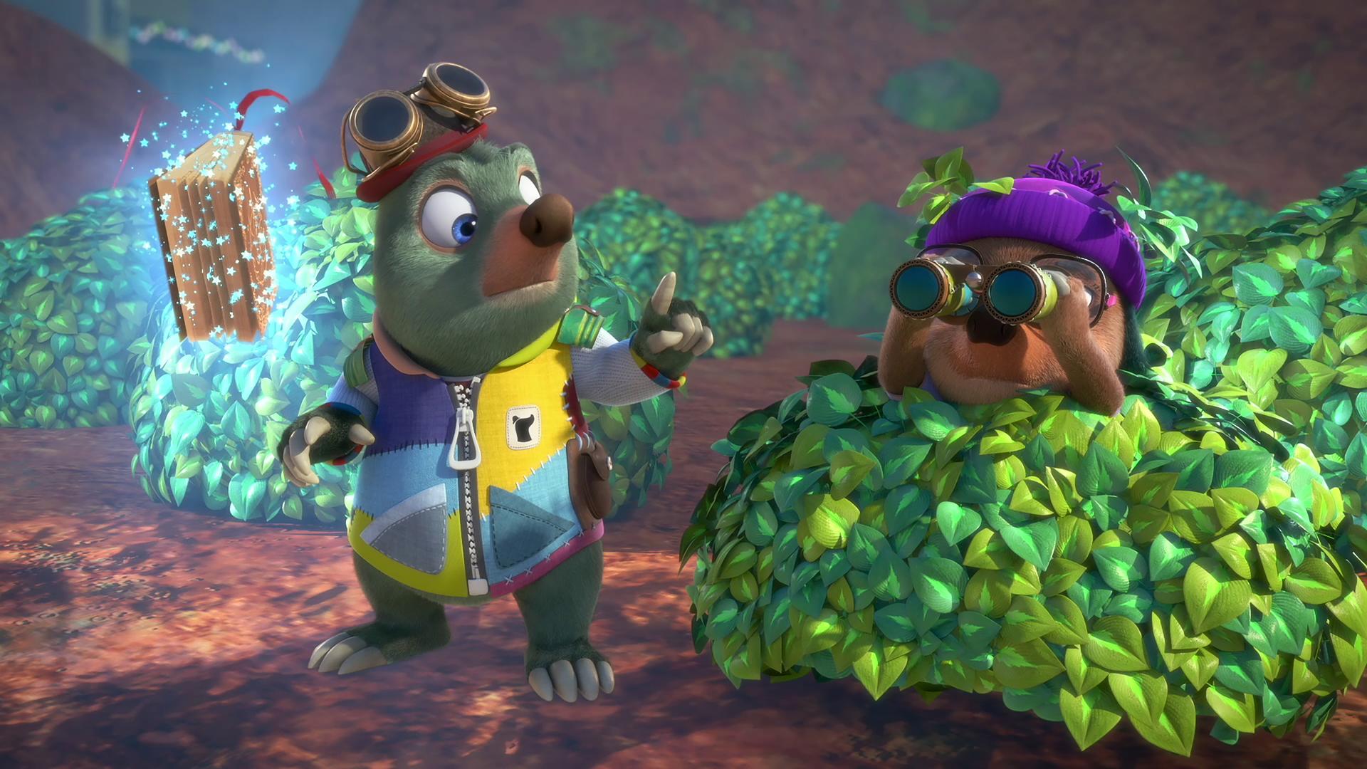 Dotty, mit einem Fernglas vor den Augen, sitzt getarnt in einem Busch und beobachtet etwas in der Ferne. Moley und das magische Buch Mauli befinden sich neben ihr.