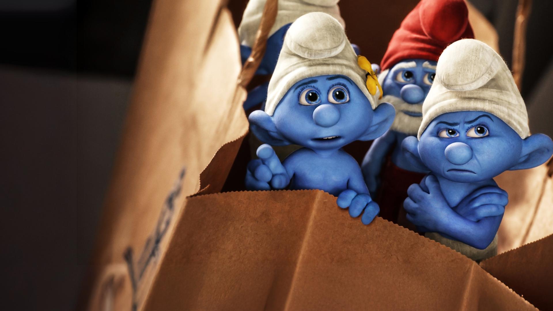 Plakatmotiv zum Film mit drei Schlümpfen.