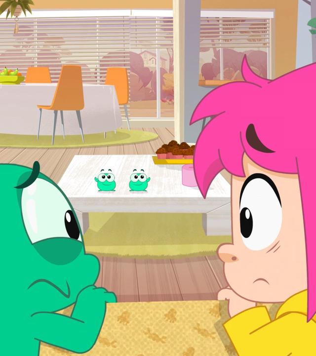 Ernest und Rebecca wundern sich sehr über die zwei kleinen Mikroben, die plötzlich in ihrem Wohnzimmer stehen.