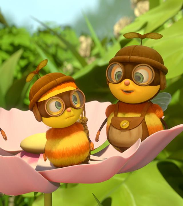 Biene Begonia (Mitte) steht mit zwei anderen Sammelbienen auf einer Blüte. Sie tragen Fliegerbrillen.