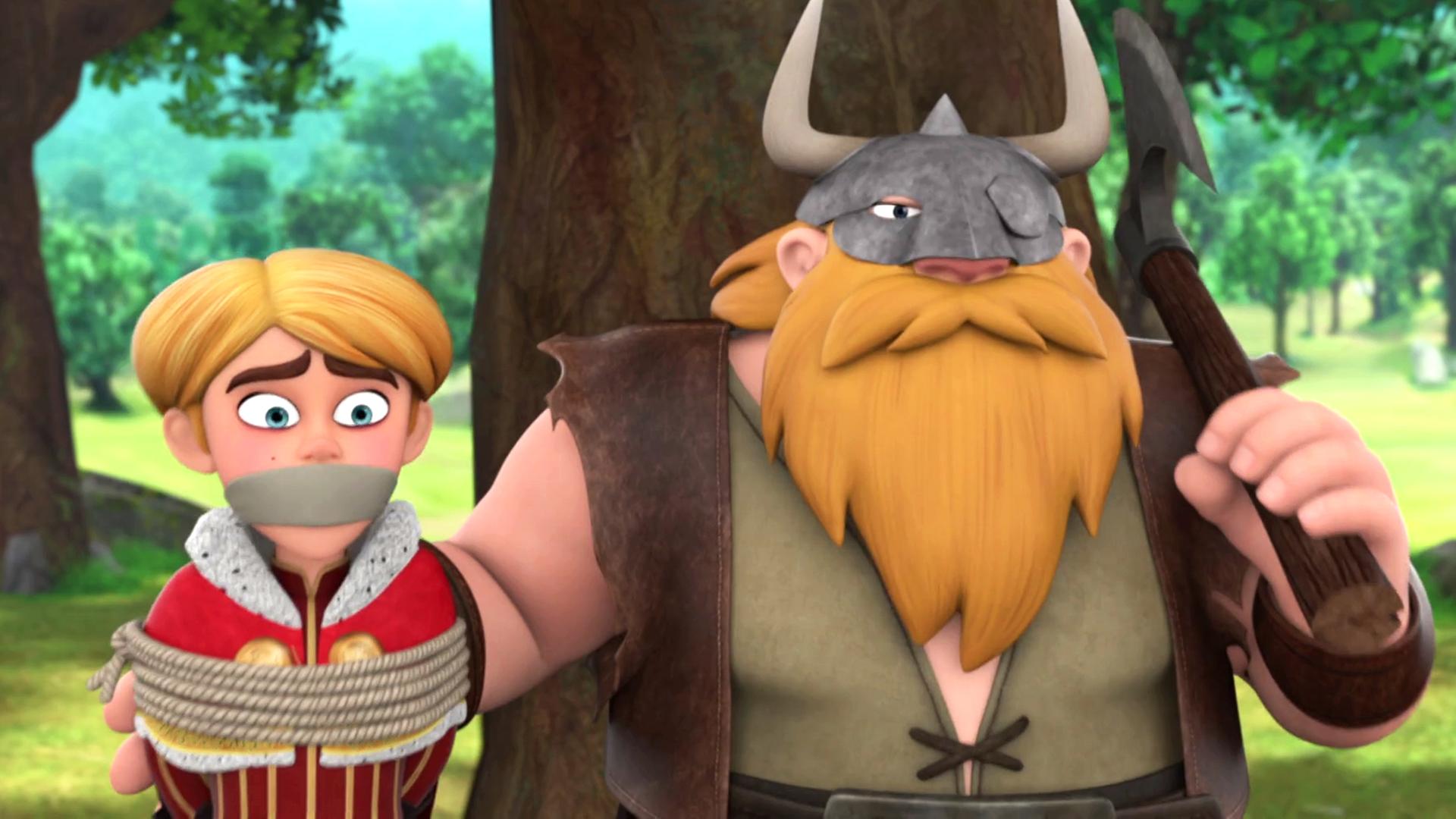 Prinz John (links) ist mit einem Seil gefesselt, der Mund wurde ihm zugeklebt. Rechts neben ihm steht ein Wikinger mit langem Bart, den rechten Arm hat er um Prinz John gelegt, mit der linken Hand stützt er eine Axt auf seine Schulter. Er trägt einen Helm.