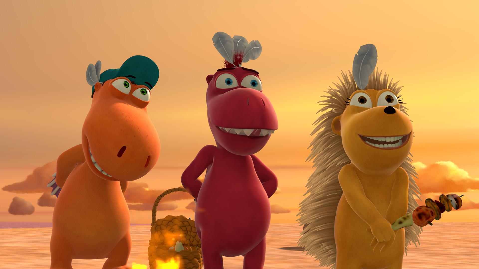 Kokosnuss, Oskar und Matilda stehen grinsend nebeneinander. Matilda hält einen Spieß mit verkohltem Essen in der Hand und Oskar einen brennenden Korb.