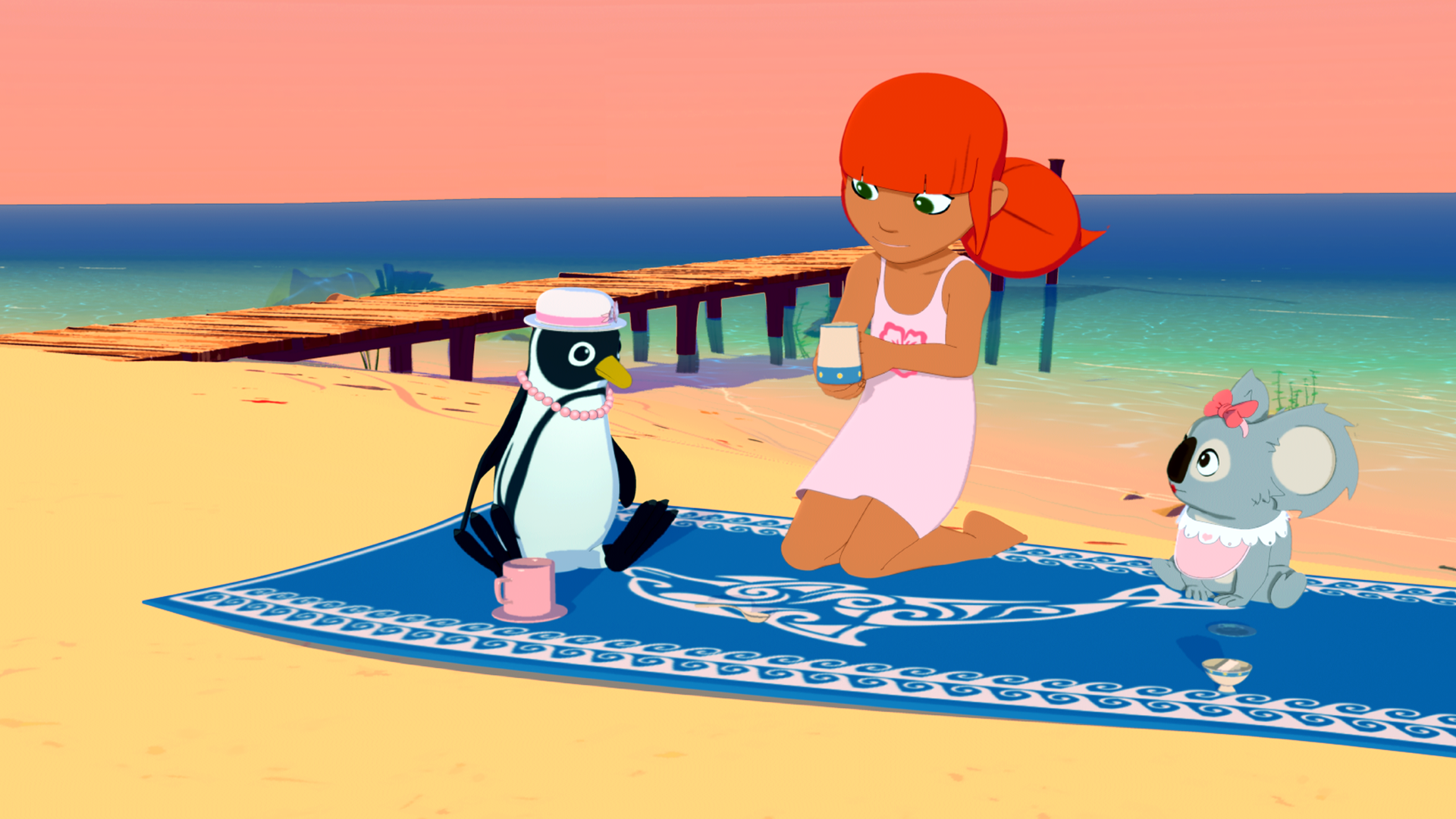 Marina sitzt mit dem Pinguin Aglaga und dem Koala Raoul auf einer Picknickdecke am Strand. Sie trinken Tee.