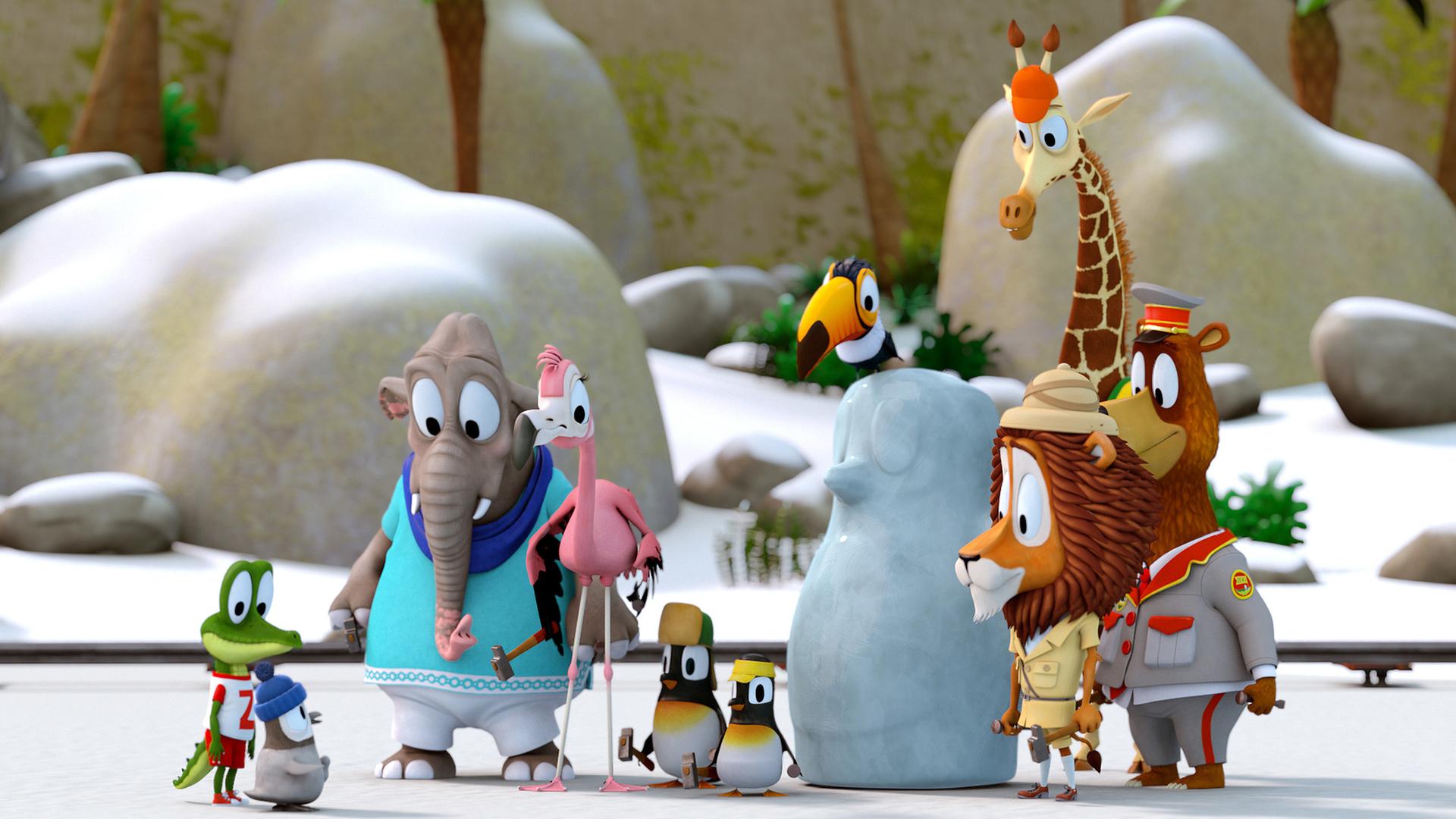 Eiskünstler Kurti. Die Zoobande steht vor dem kleinen Pinguin Kurti und blickt auf ihn hinunter.