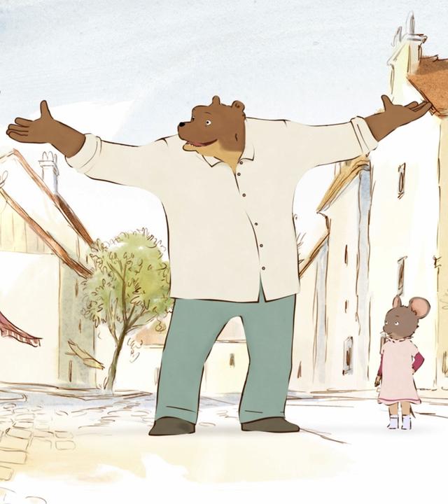 Der Bär Ernest steht auf der Straße, er breitet beide Arme aus und sieht unternehmungslustig aus. Neben ihm steht Celestine in ihrem rosa Kleid. Sie sieht eher besorgt aus. Im Hintergrund sieht man die Straße mit Häusern, Bäumen und Geschäften.