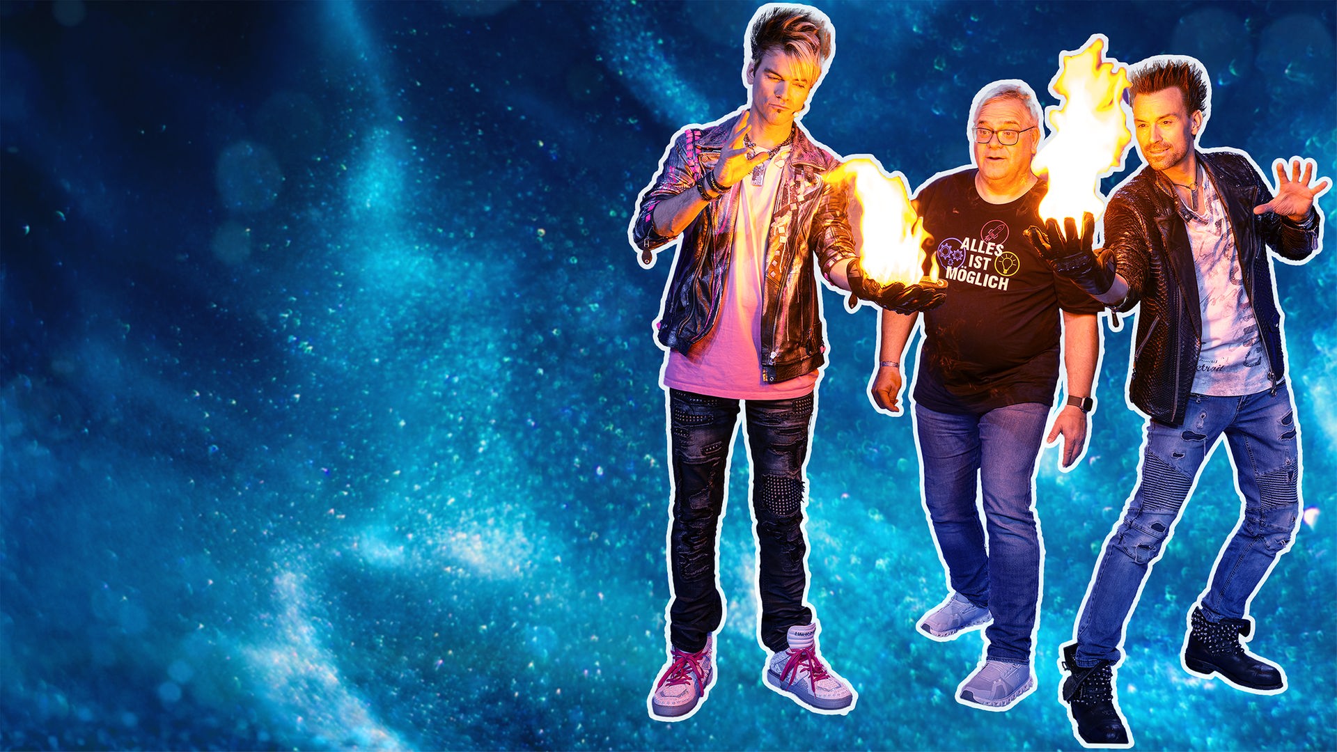 Die Ehrlich Brothers haben Flammen in der Hand und Elton steht zwischen Ihnen