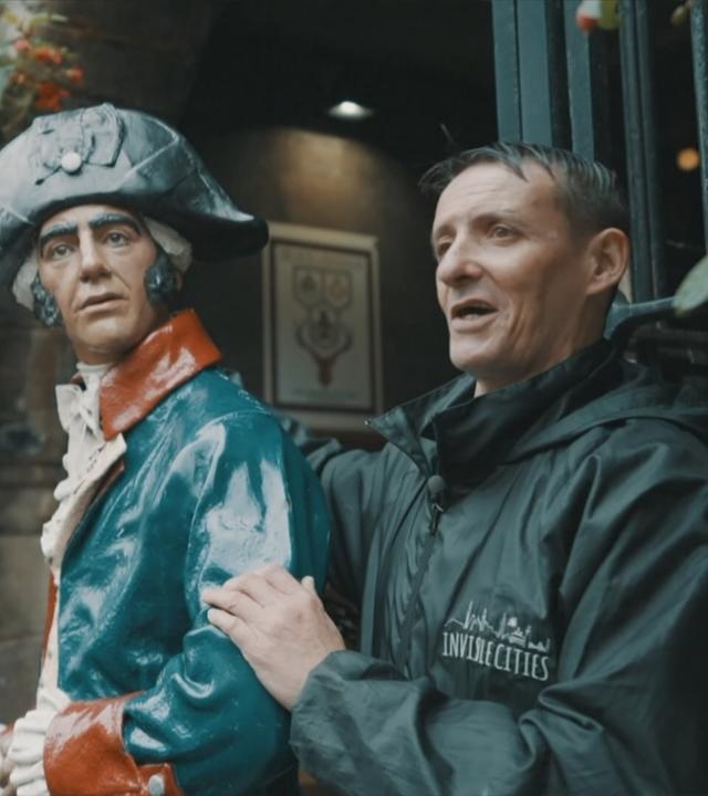 Obdachloser Mann als Stadtführer