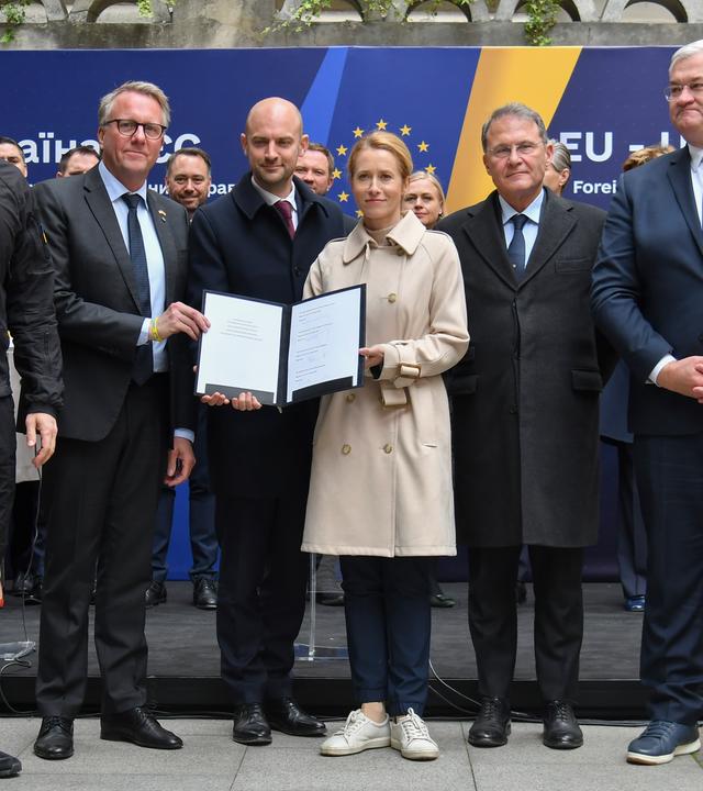 Ukraine's Prime Minister of Ukraine Denys Shmyhal, Danish Minister of Business Morten Bodskov, French Foreign Minister Jean-Noel Barrot, EU High Representative for Foreign Affairs and Security Policy Kaja Kallas, and Ukrainian Foreign Minister Andrii Sybiha show a signed document during a EU-Ukraine Foreign Ministers' meeting in Lviv.