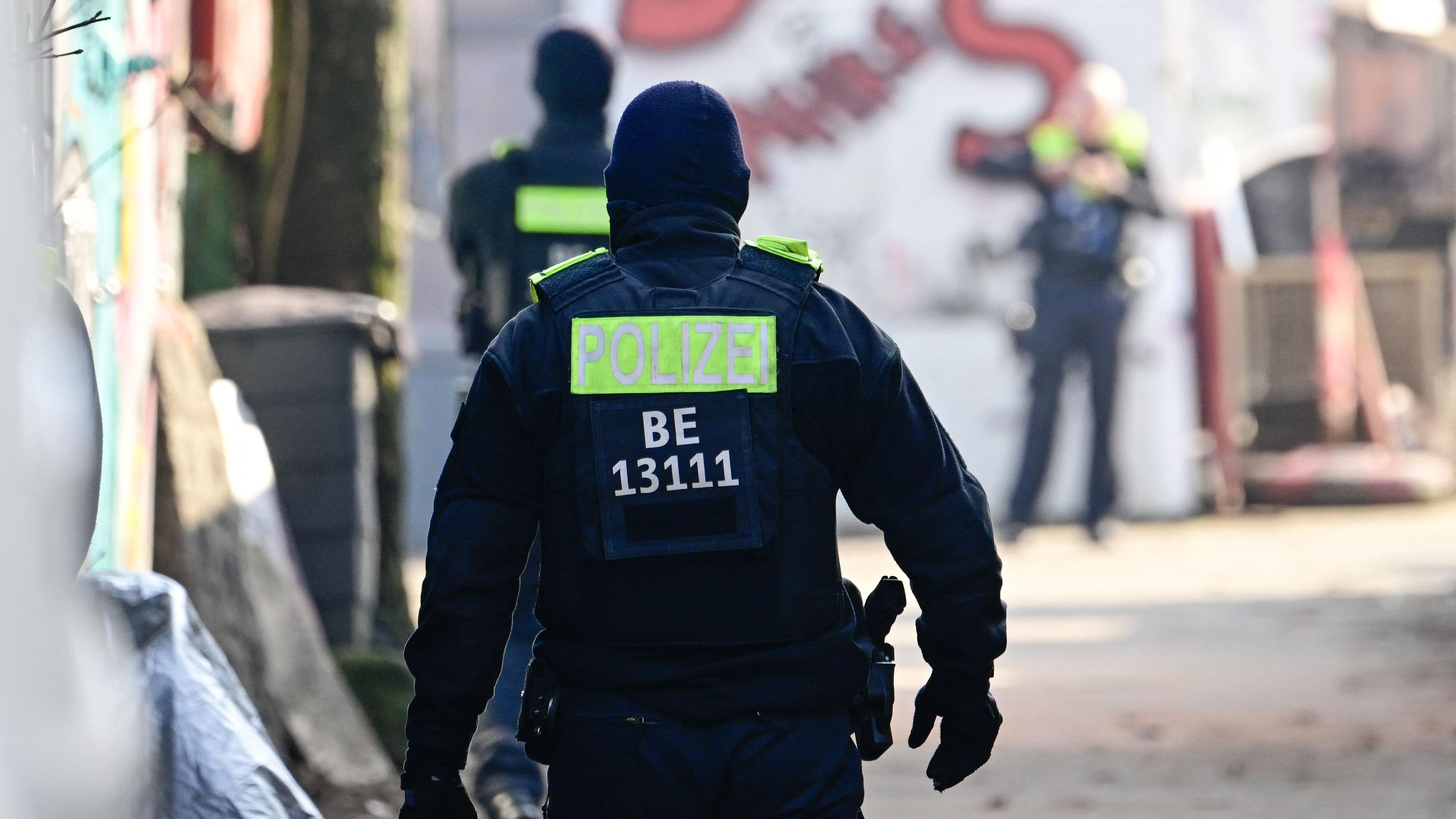 Police search an area in Berlin on February 3, 2024 where police arrested two men in Berlin during a manhunt for two members of the far-left militant Baader-Meinhof gang