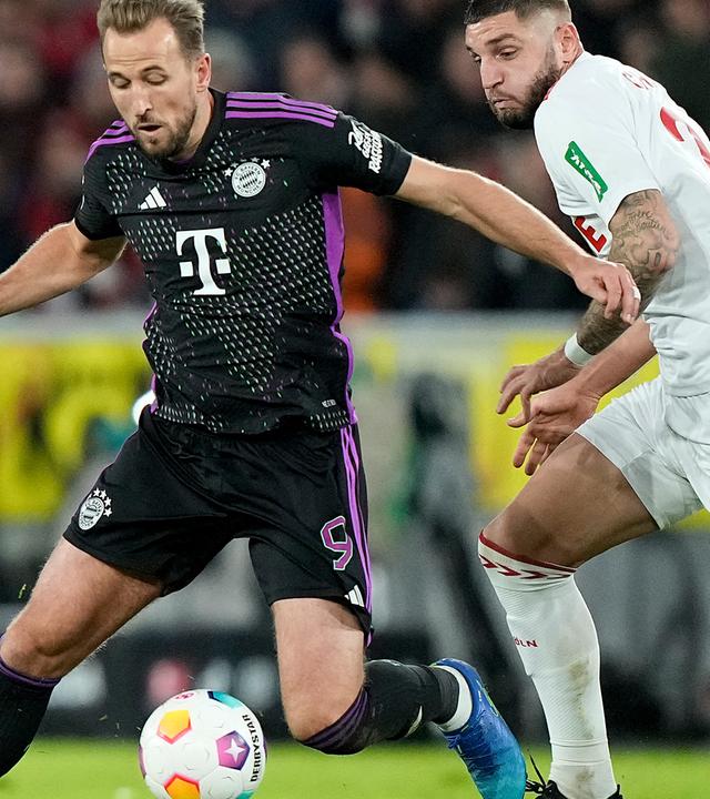 Harry Kane und Julian Chabot im Zweikampf am 24.11.23.