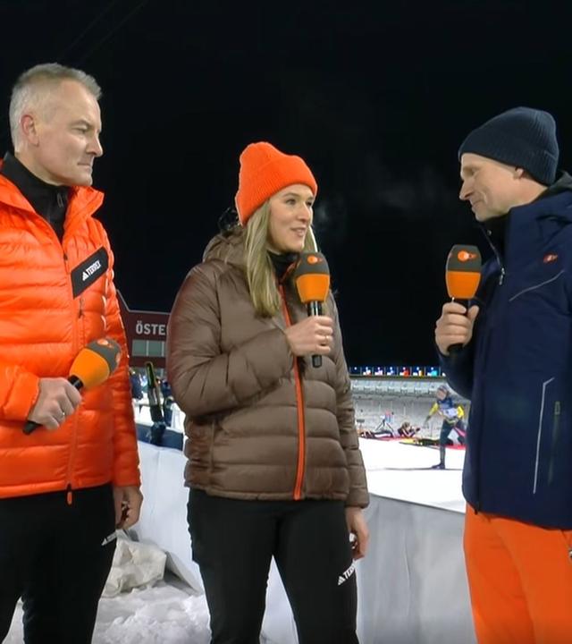ZDF-Biathlon-Experten Denise Herrman-Wick und Sven Fischer mit Moderator Alexander Ruda