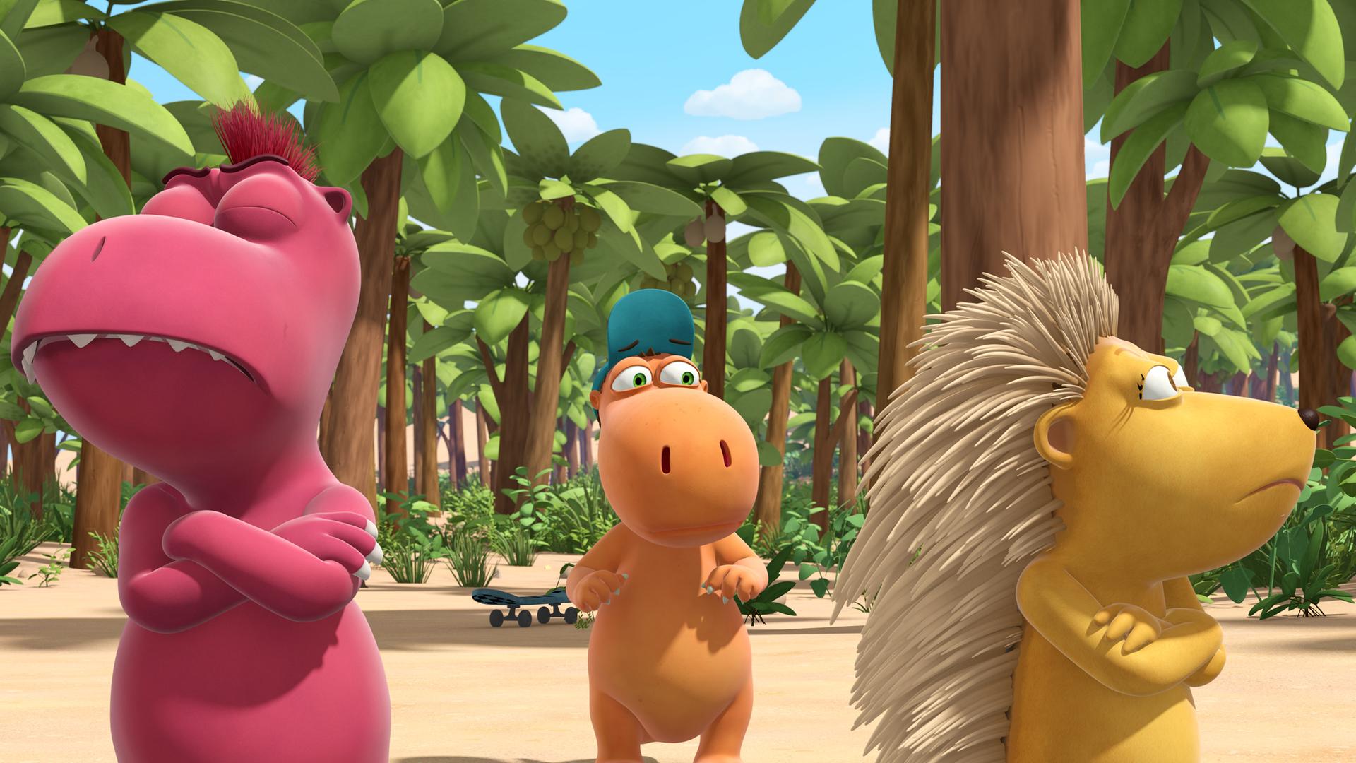 Der traurig aussehende Kokosnuss steht zwischen Oskar (links) und Matilda (rechts). Beide haben die Arme vor ihrem Körper verschränkt und sehen verärgert aus. Sie gucken beide in unterschiedliche Richtungen.