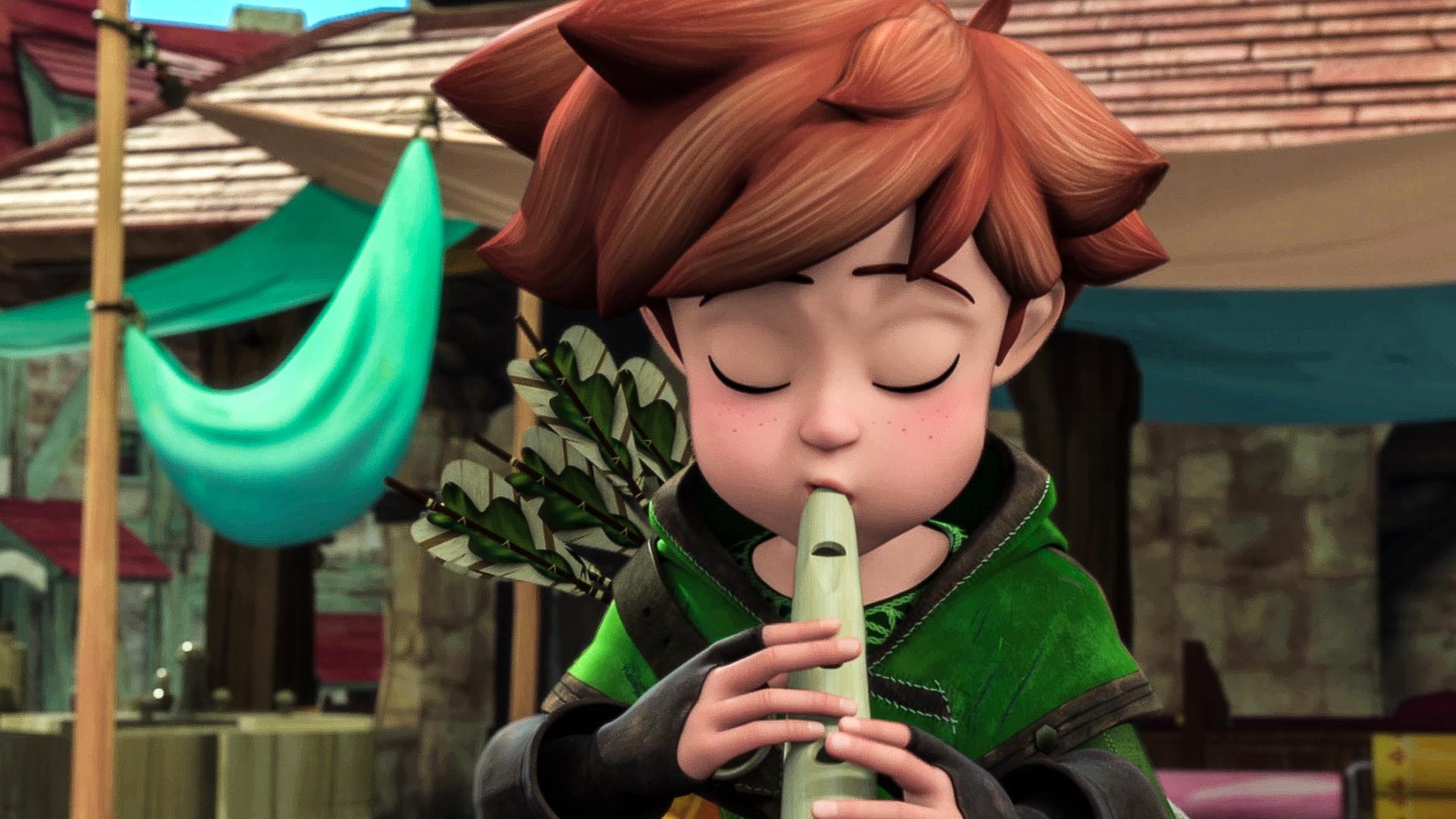 Robin hält eine Blockflöte in der Hand und spielt darauf.