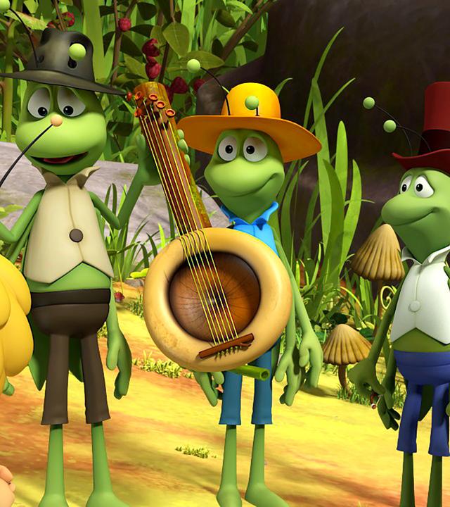 Flip und seine vier Bandmitglieder. Der zweite von links hält ein Banjo-ähnliches Instrument in den Händen.