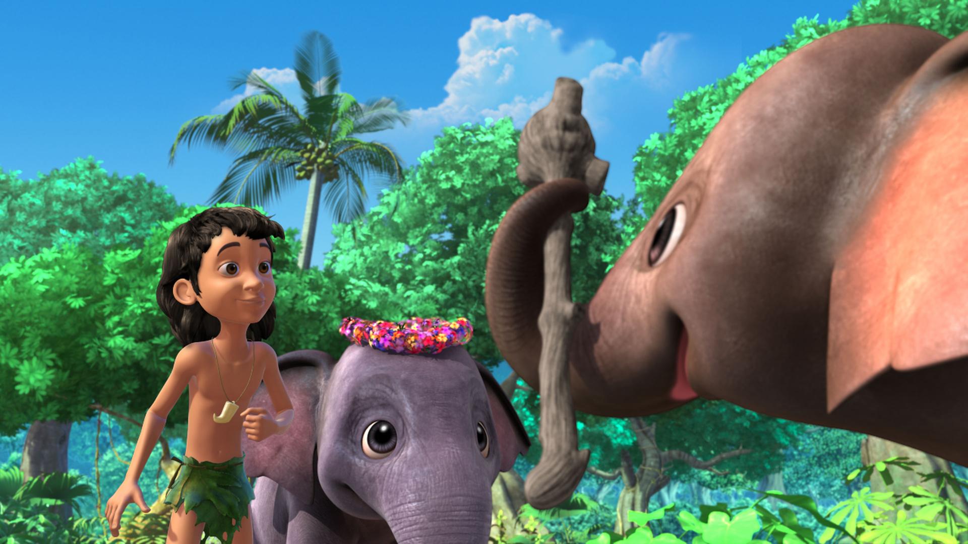 Appu (links) hält einen Stock mit dem Rüsssel. Hita (mitte) und Mogli (rechts) schauen dabei zu.