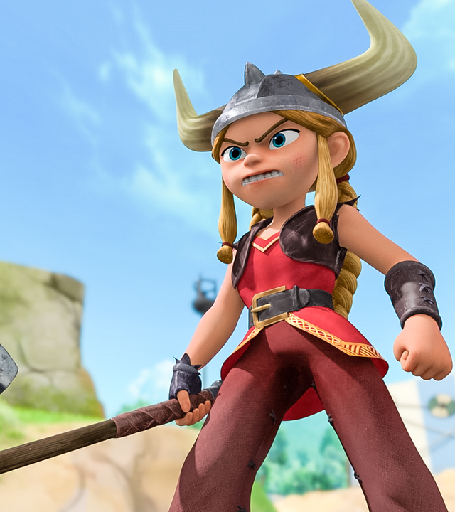 Das starke Wikingermädchen Liv hält kriegerisch eine große Axt in ihrer linken Hand und hat angriffslustig die andere Hand zur Faust geballt. Ihr Blick ist drohend.