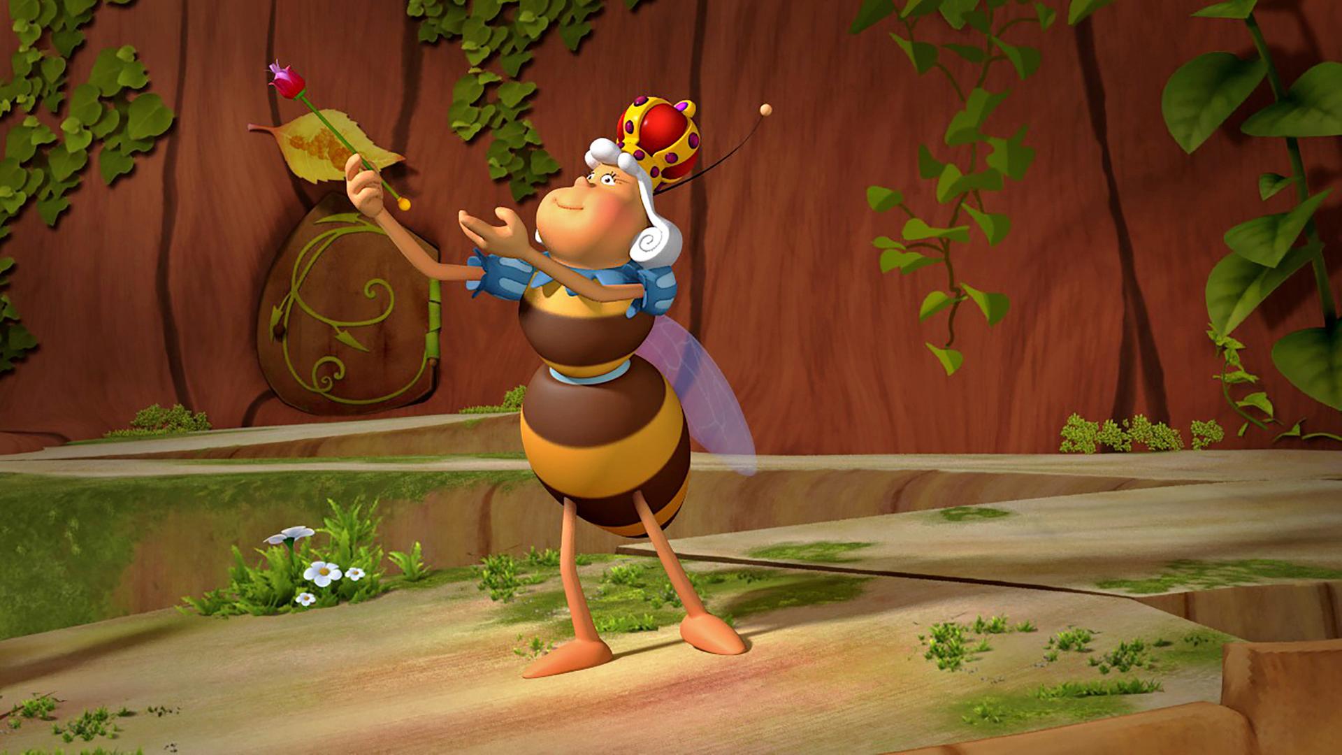 Die Königin vollführt den rituellen Frühlingsgruß mit Zepter in der Hand.