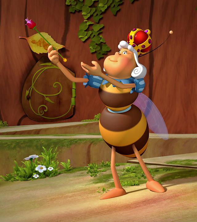 Die Königin vollführt den rituellen Frühlingsgruß mit Zepter in der Hand.