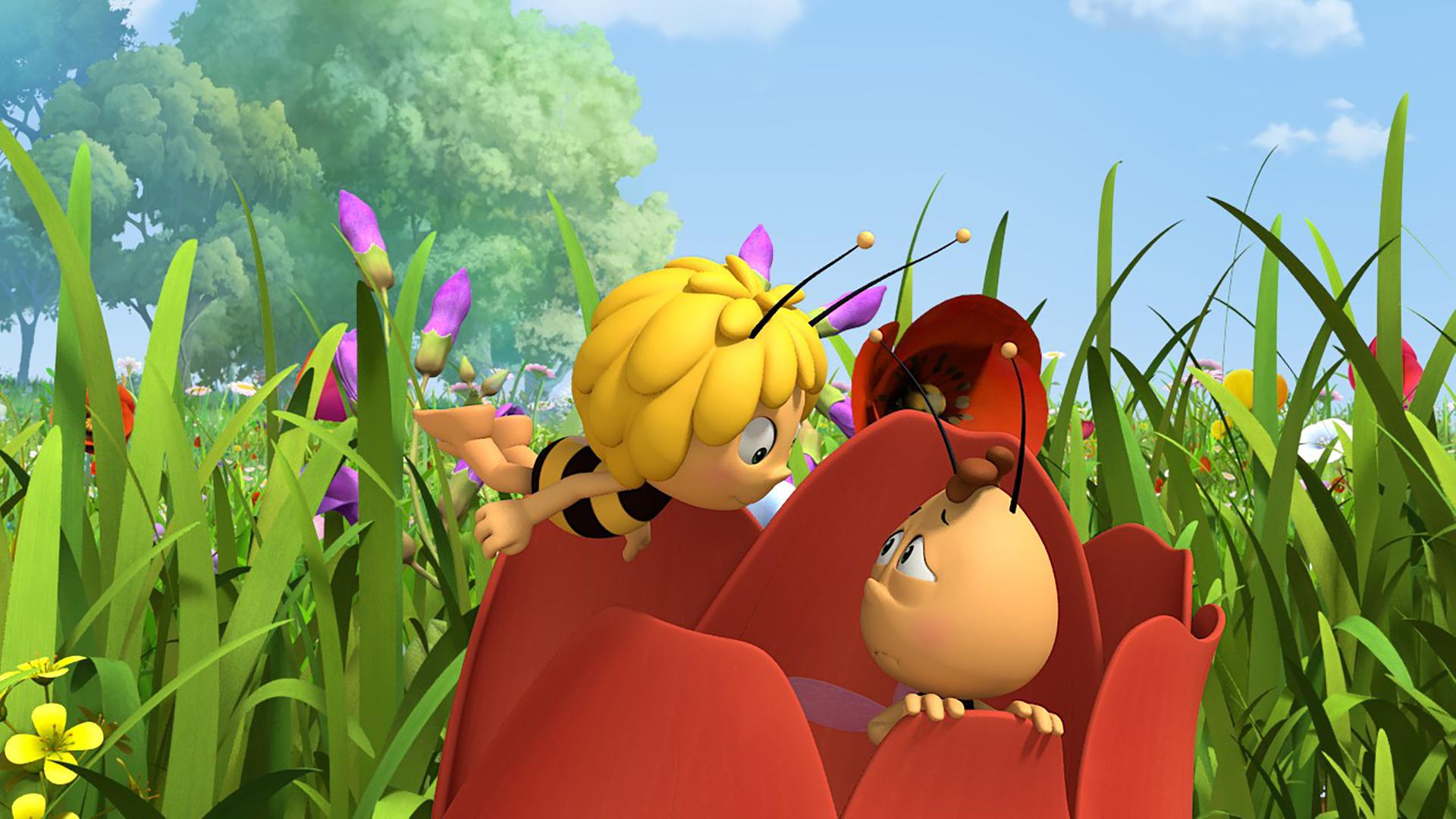 Maja findet Willi in einer Blume versteckt.