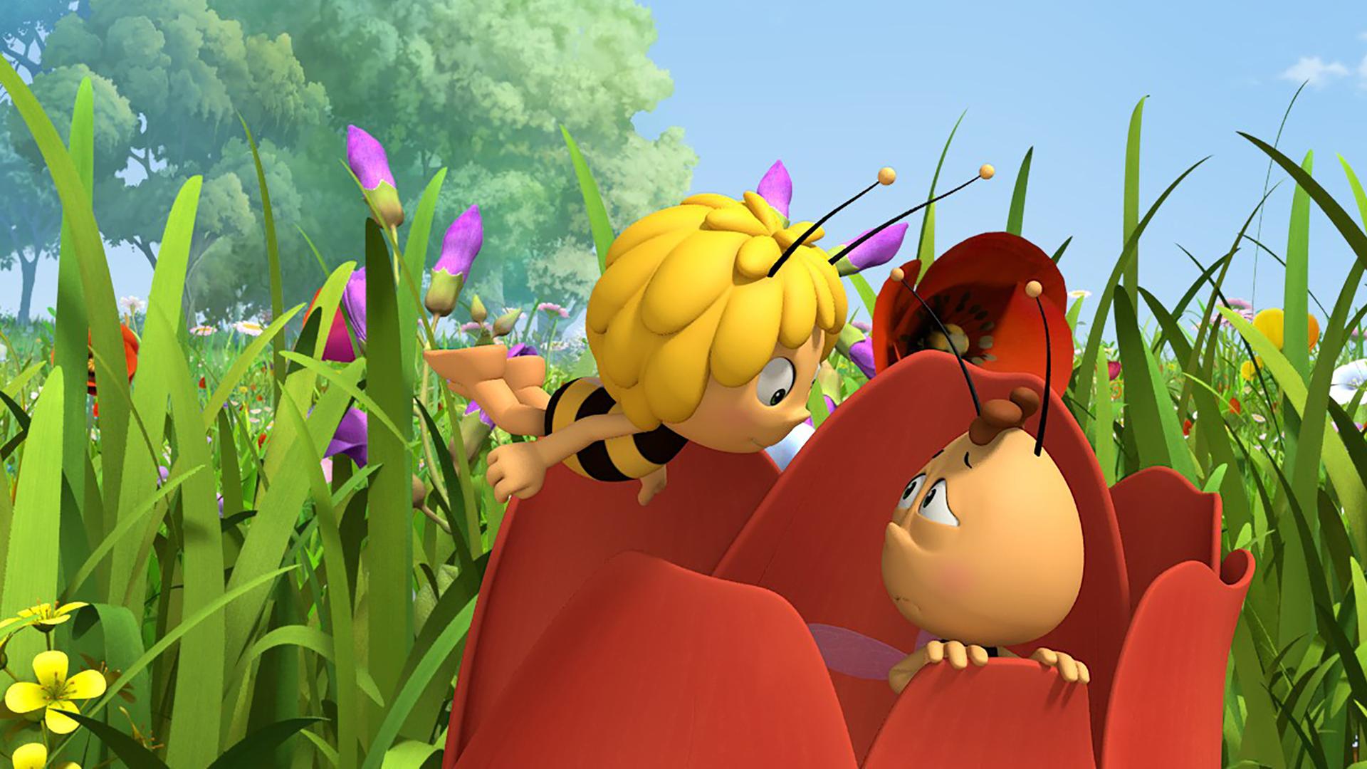 Maja findet Willi in einer Blume versteckt.