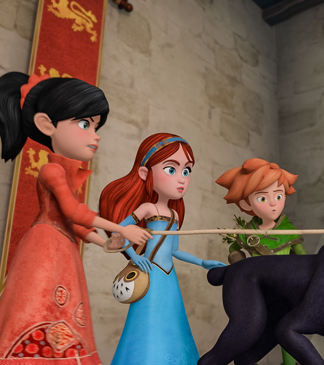 Scarlett, Marian und Robin Hood halten die Leine von Hund Flynn.