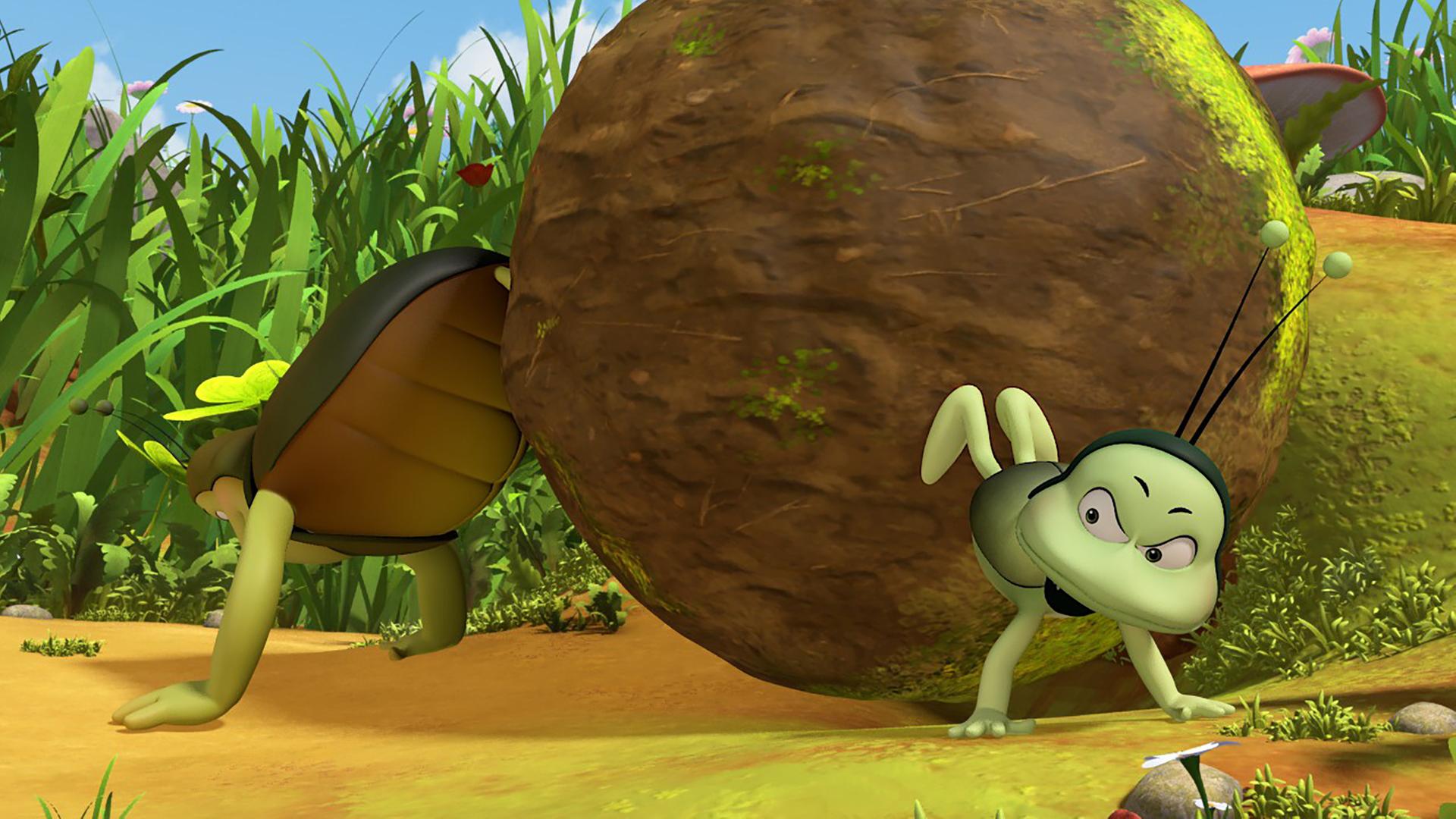 Kurt und Max mühen sich ab, die Vorherrschaft über einen Mistball zu erhalten.