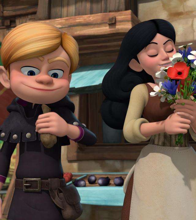 Illusionist Landrin hat einen Beutel mit Geldstücken in der rechten Hand. Er schaut zufrieden. Neben ihm steht eine Dorfbewohnerin und riecht an einem Blumenstrauß, den sie in der Hand hält.