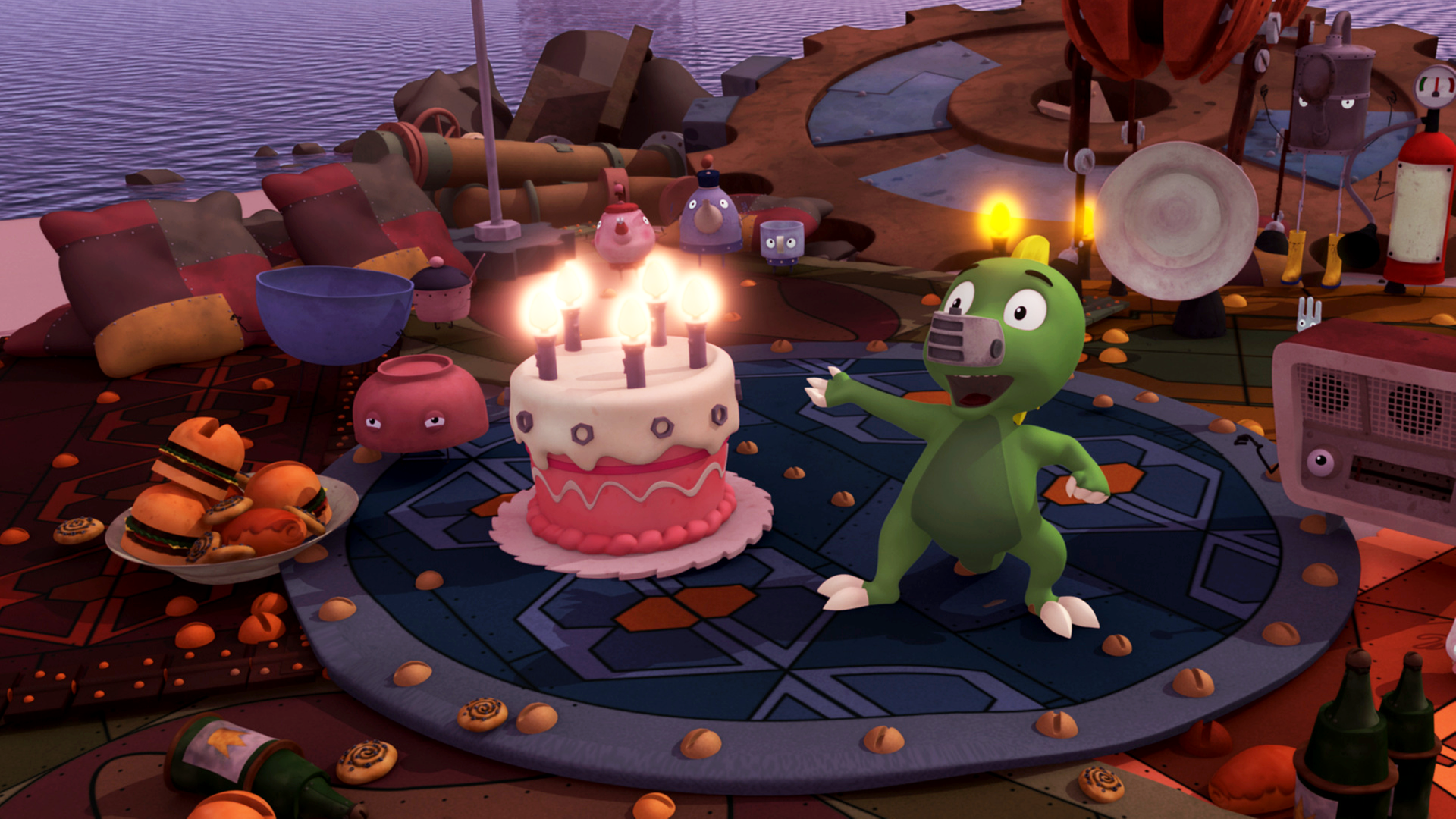 Koks steht neben einer Geburtstagstorte mit Kerzen. 