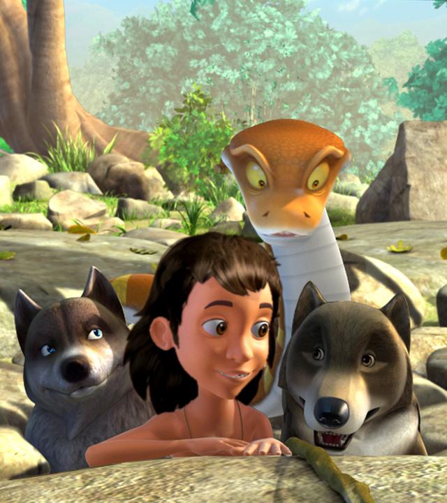 Mogli und Kaa retten die Wolfskinder aus der Höhle.