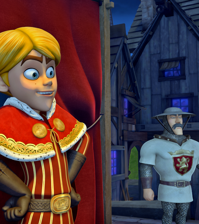 Prinz John steht mit seinen Armen in die Hüften gestemmt und schaut mit weit aufgerissenen Augen nach vorne. Im Hintergrund leistet eine Wache ihren Dienst.