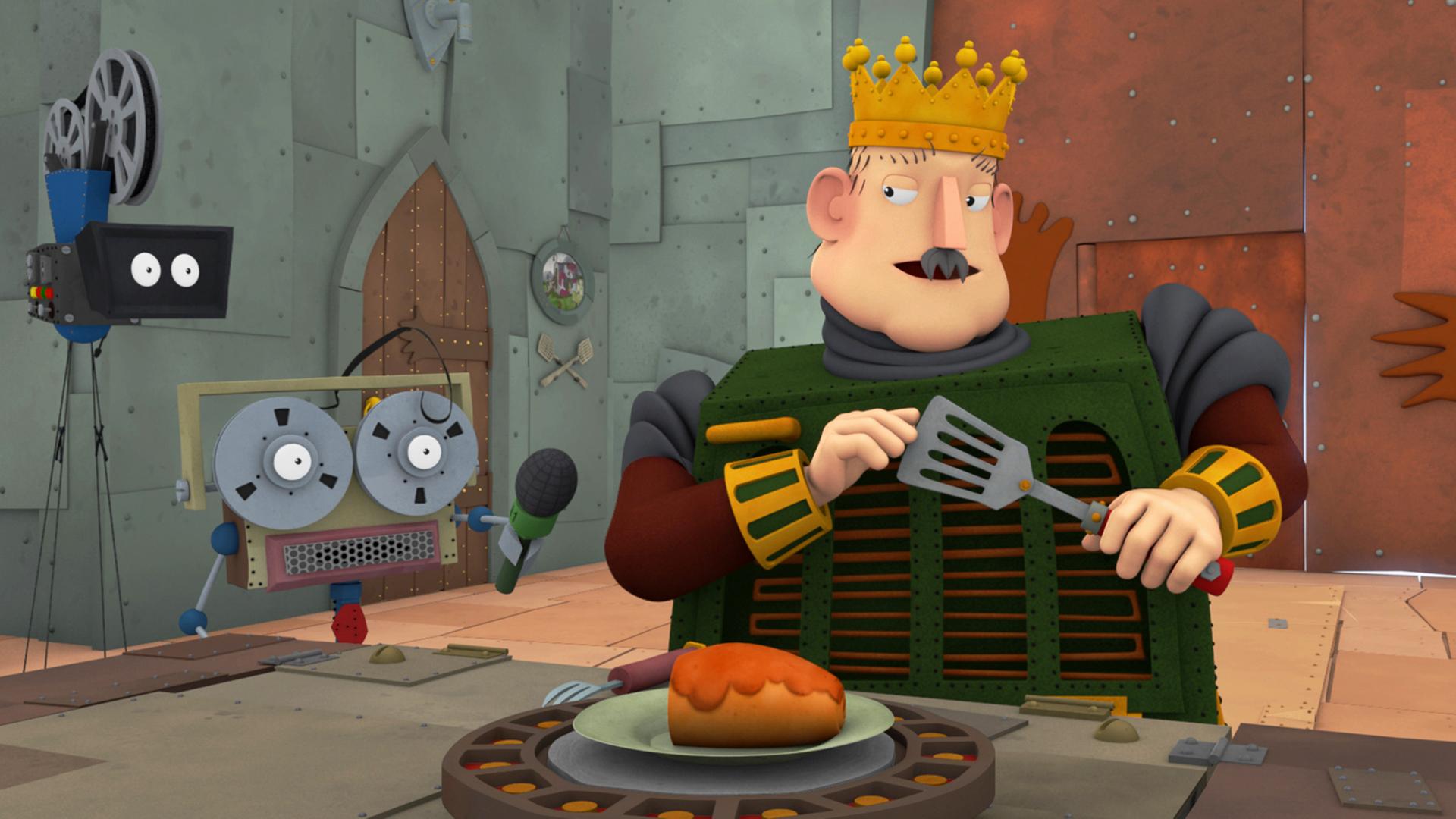 Der König wird während des Essens vor laufender Kamera interviewed. 