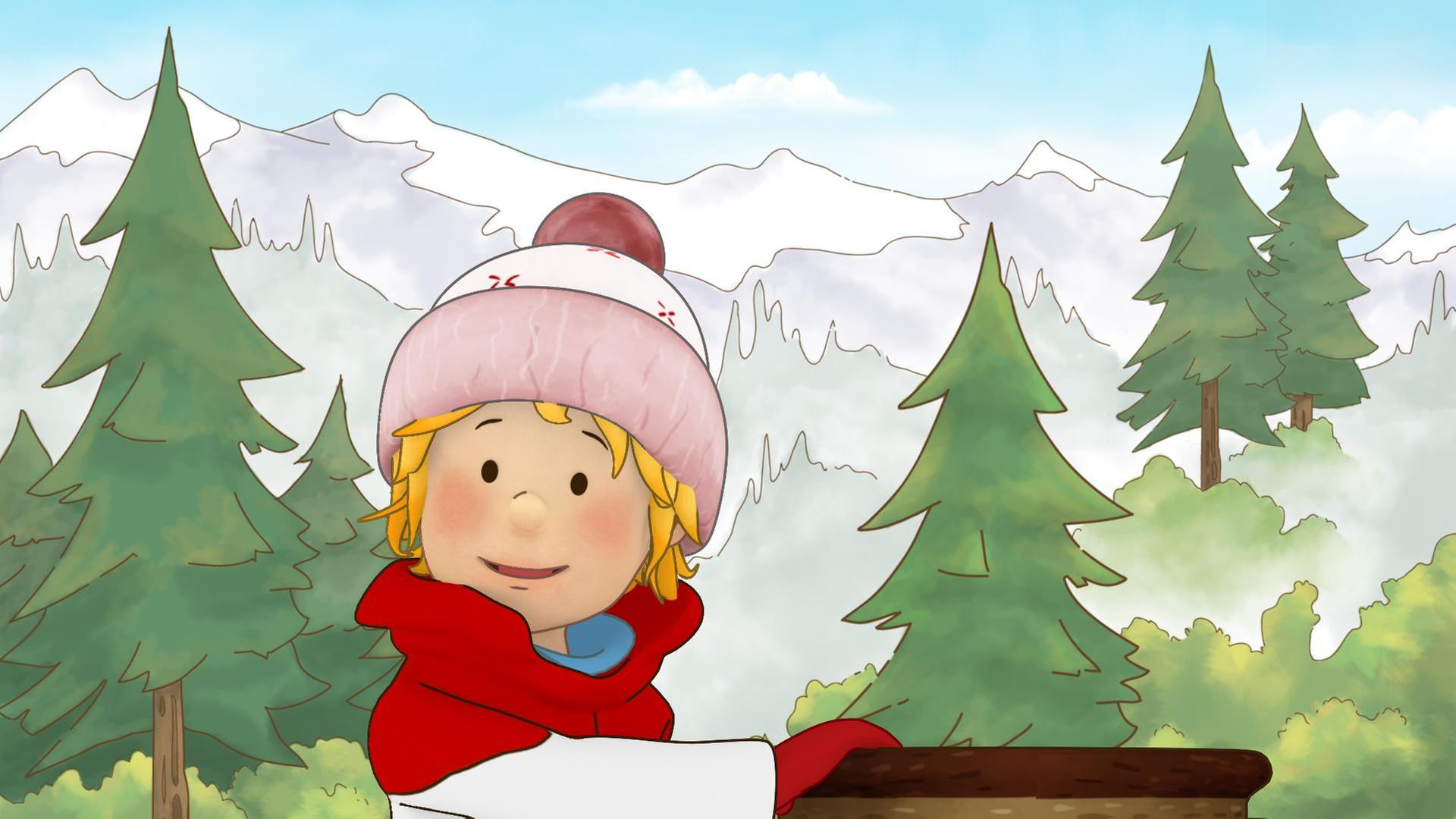 Conni spielt im Schnee. Dafür hat sie eine dicke Mütze und warme Kleidung an. Hinter ihr sind hohe Berge zu sehen, die mit Schnee bedeckt sind.